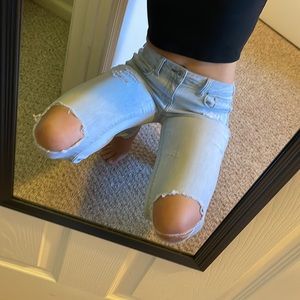 AMERICAN EAGLE Mid-Rise Distressed Skinny Jeans in Light Wash